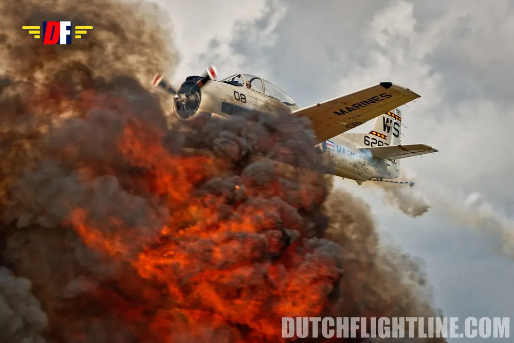 Unique airshow photo of T-28 Trojan at La Ferté Alais 2025 flying through explosion. Picture made by Dutch Flightline